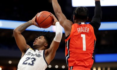 Marquette Golden Eagles forward David Joplin (23) shoots while guarded by Illinois Fighting Illini guard Trent Frazier (1) during the first half of their game at Fiserv Forum in Milwaukee on Monday, Nov. 15, 2021. - Photo by Mike De Sisti / Milwaukee Journal Sentinel ORG XMIT: DBY1 Mjs Mumen 02979