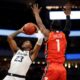 Marquette Golden Eagles forward David Joplin (23) shoots while guarded by Illinois Fighting Illini guard Trent Frazier (1) during the first half of their game at Fiserv Forum in Milwaukee on Monday, Nov. 15, 2021. - Photo by Mike De Sisti / Milwaukee Journal Sentinel ORG XMIT: DBY1 Mjs Mumen 02979