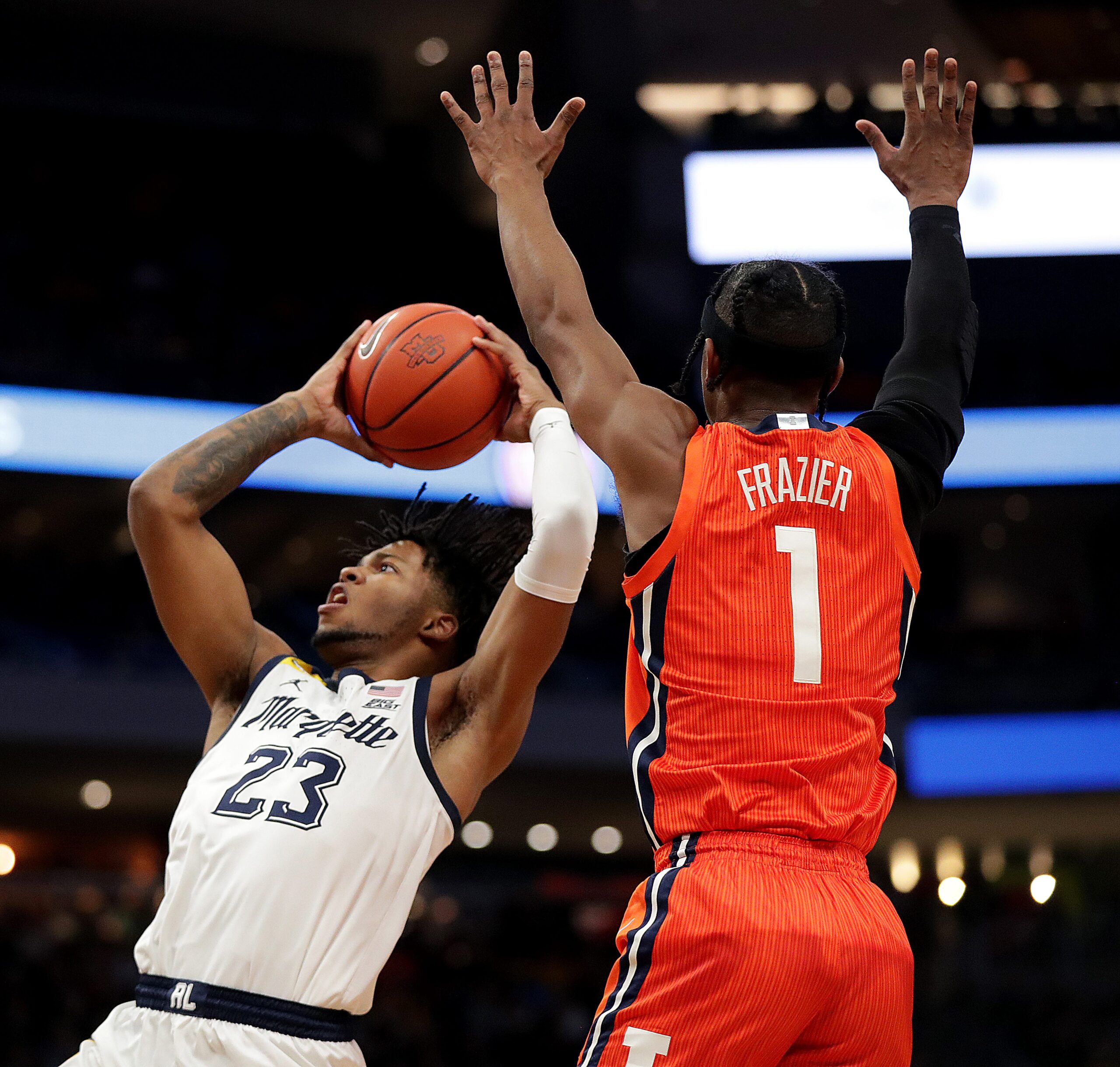 Marquette Golden Eagles forward David Joplin (23) shoots while guarded by Illinois Fighting Illini guard Trent Frazier (1) during the first half of their game at Fiserv Forum in Milwaukee on Monday, Nov. 15, 2021. - Photo by Mike De Sisti / Milwaukee Journal Sentinel ORG XMIT: DBY1 Mjs Mumen 02979