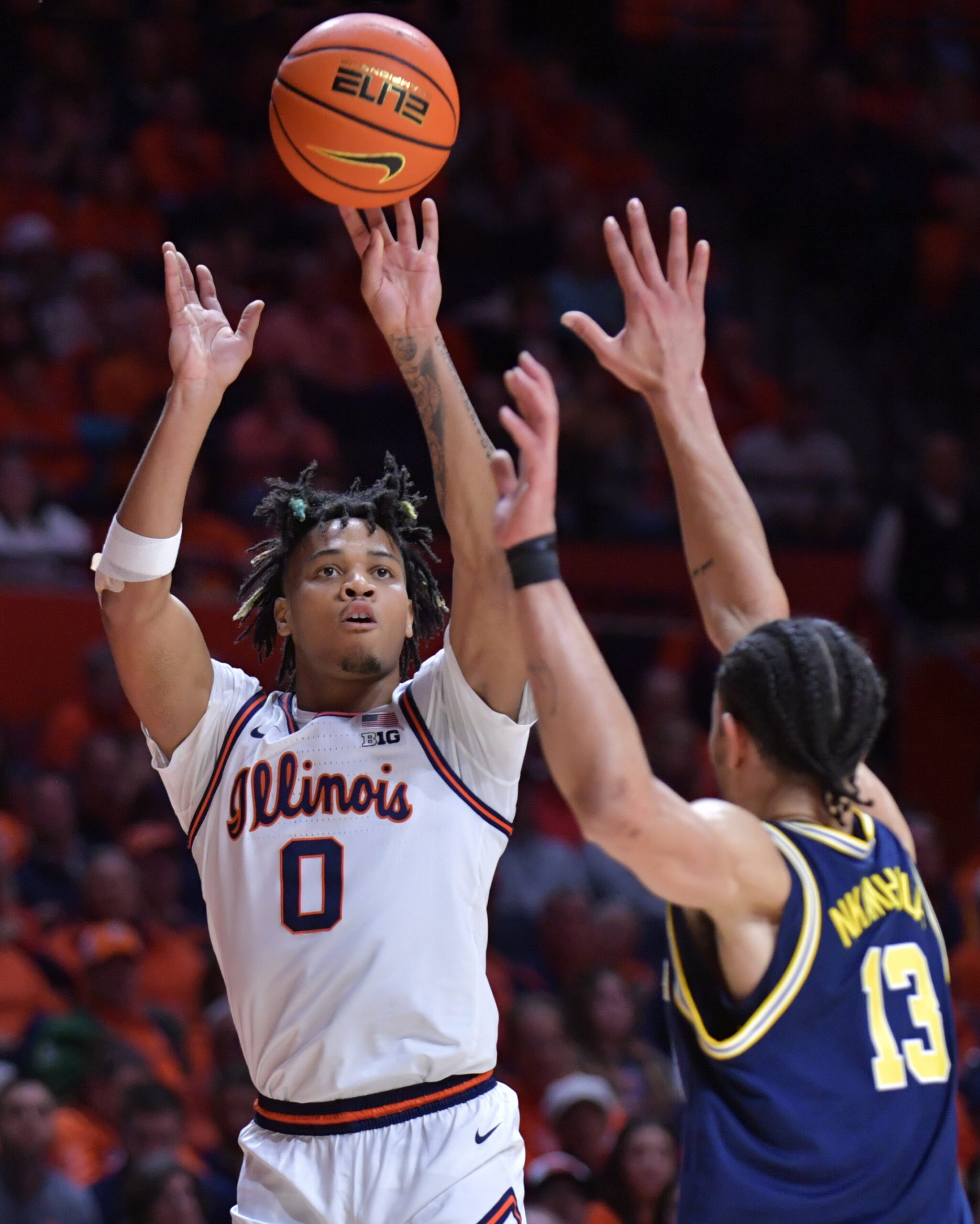 Michigan Basketball Coach says "You're Welcome" about Illinois Basketball Star