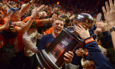 Former Illinois Basketball Guard, Brandin Podziemski, holding the Big Ten Championship trophy