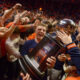 Former Illinois Basketball Guard, Brandin Podziemski, holding the Big Ten Championship trophy