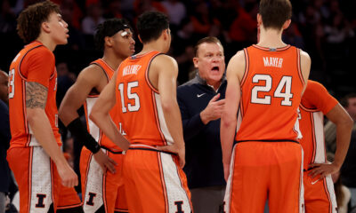 Illinois basketball head coach Brad Underwood talks to his team.