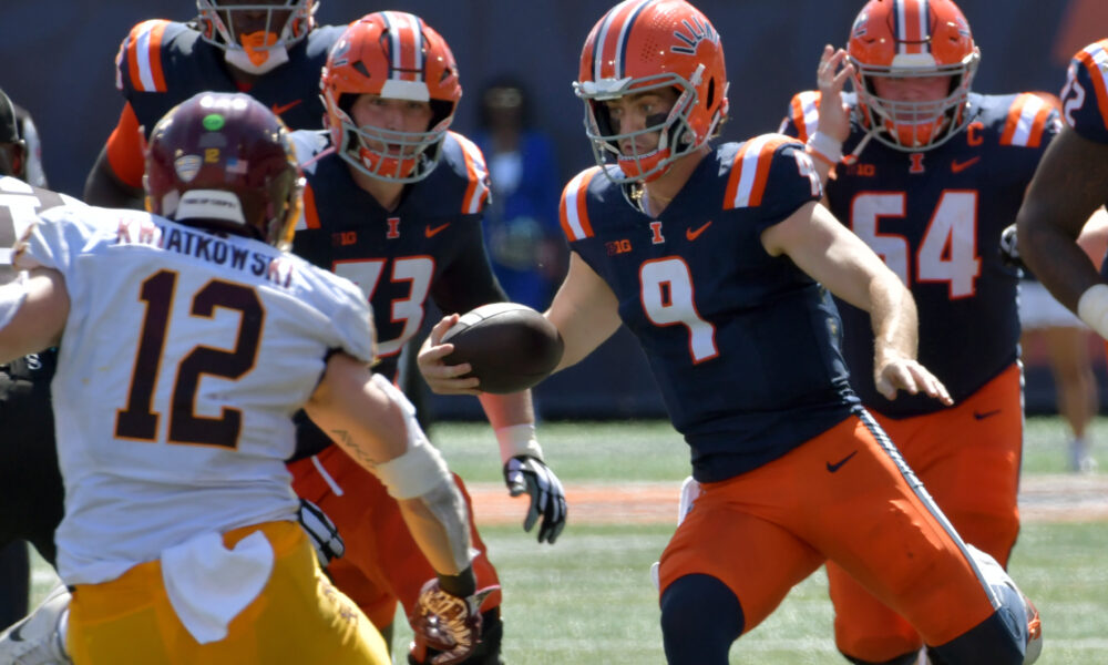 Sep 14, 2024; Champaign, Illinois, USA; Illinois Fighting Illini quarterback Luke Altmyer (9) runs with the ball against the Central Michigan Chippewas during the first half at Memorial Stadium. Mandatory Credit: Ron Johnson-Imagn Images