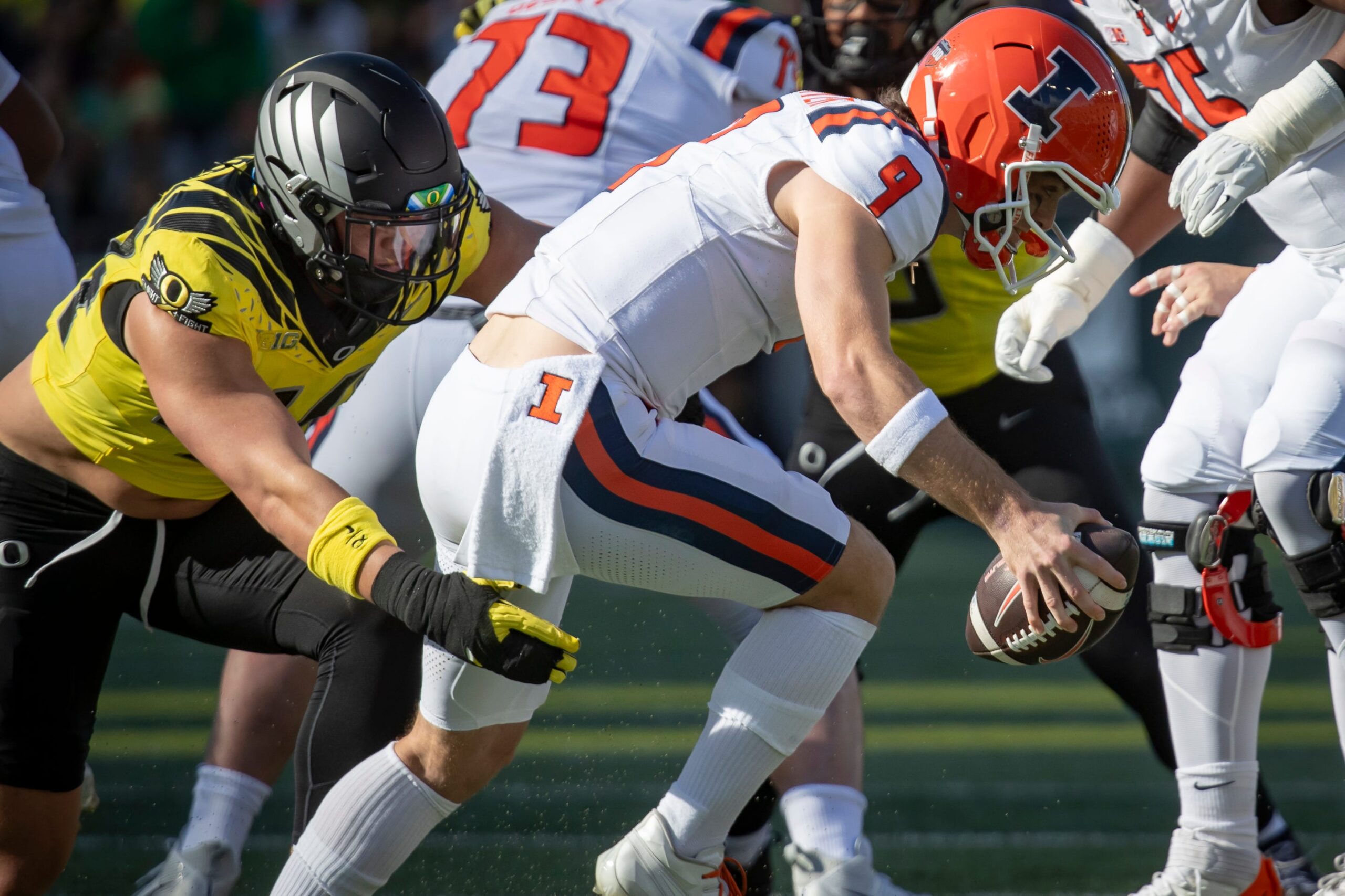 Oregon outside linebacker Teitum Tuioti sacks Illinois quarterback Luke Altmyer as the No. 1 Oregon Ducks host the No. 21 Illinois Fighting Illini Saturday, Oct. 26, 2024 at Autzen Stadium in Eugene, Ore.