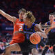 Nov 4, 2024; Champaign, Illinois, USA; Illinois Fighting Illini guard Dra Gibbs-Lawhorn (2) defends Eastern Illinois Panthers guard Zion Fruster (5) during the second half at State Farm Center. Mandatory Credit: Ron Johnson-Imagn Images