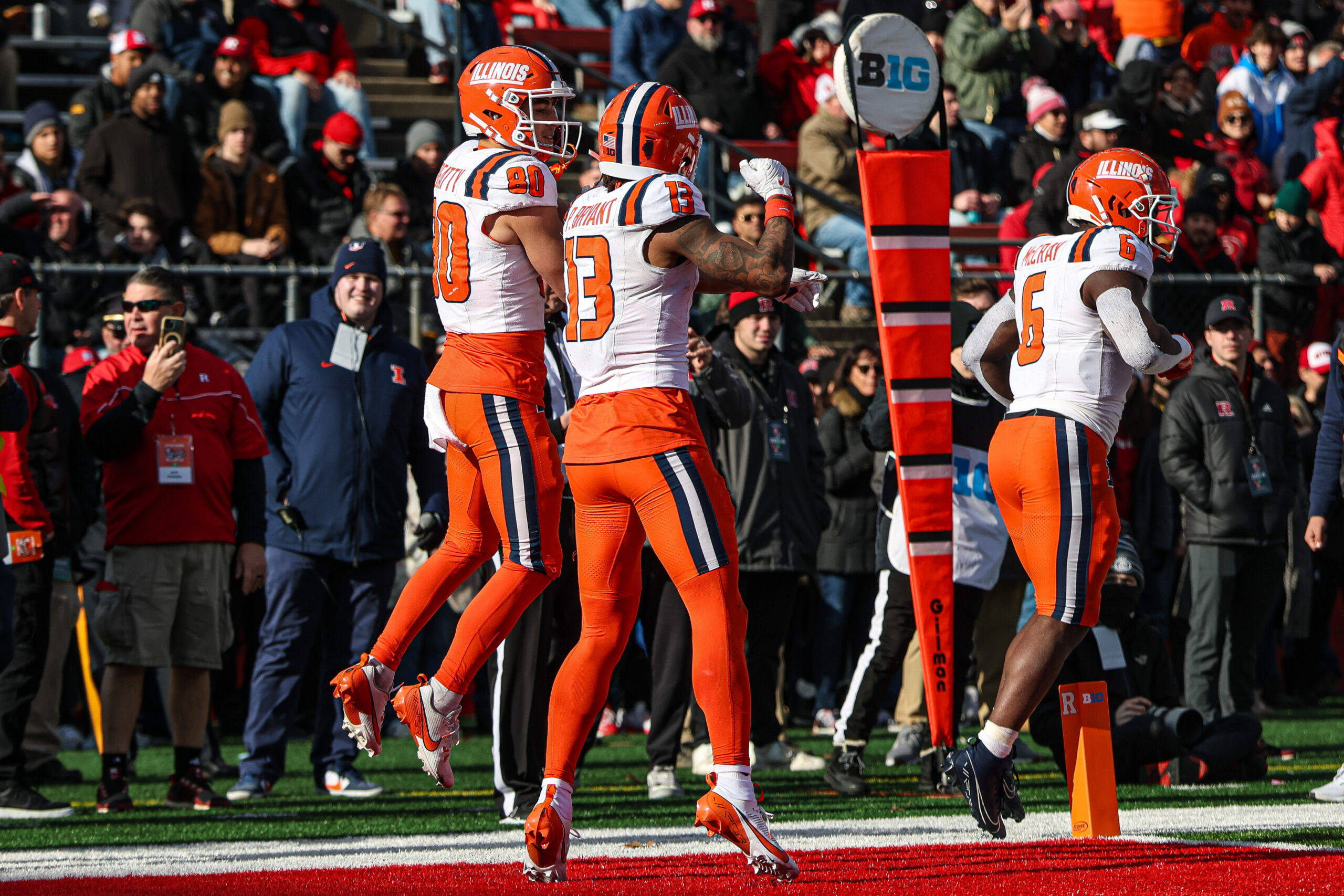 Nov 23, 2024; Piscataway, New Jersey, USA; Illinois Fighting Illini wide receiver Hank Beatty (80) celebrates his receiving touchdown with wide receiver Pat Bryant (13) during the first half against the Rutgers Scarlet Knights at SHI Stadium. Mandatory Credit: Vincent Carchietta-Imagn Images