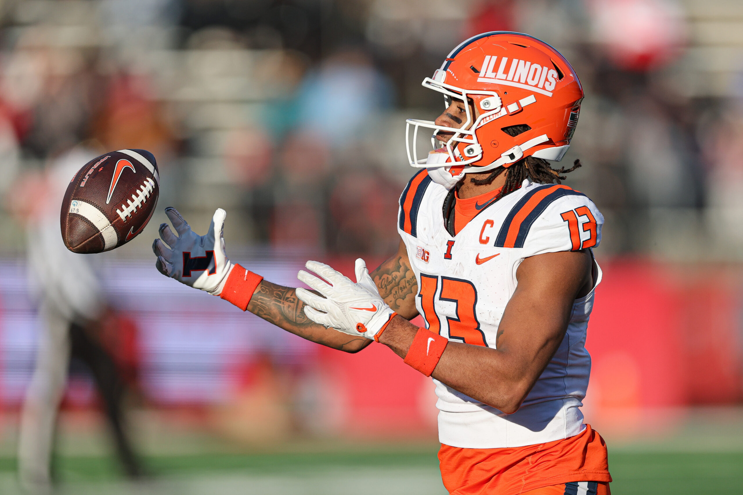 Illini football's star receiver Pat Bryant catches a pass.