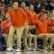 Illinois basketball and their coaching staff watches a play vs Northwestern.