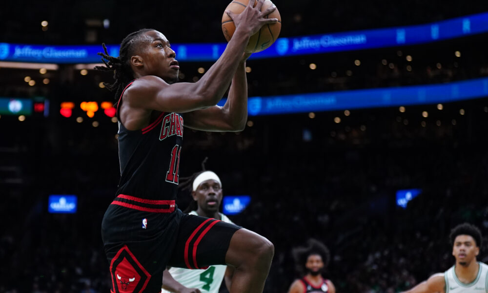 Former Illini Ayo Dosunmu going up for a layup vs the Celtics.