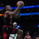 Former Illini Ayo Dosunmu going up for a layup vs the Celtics.