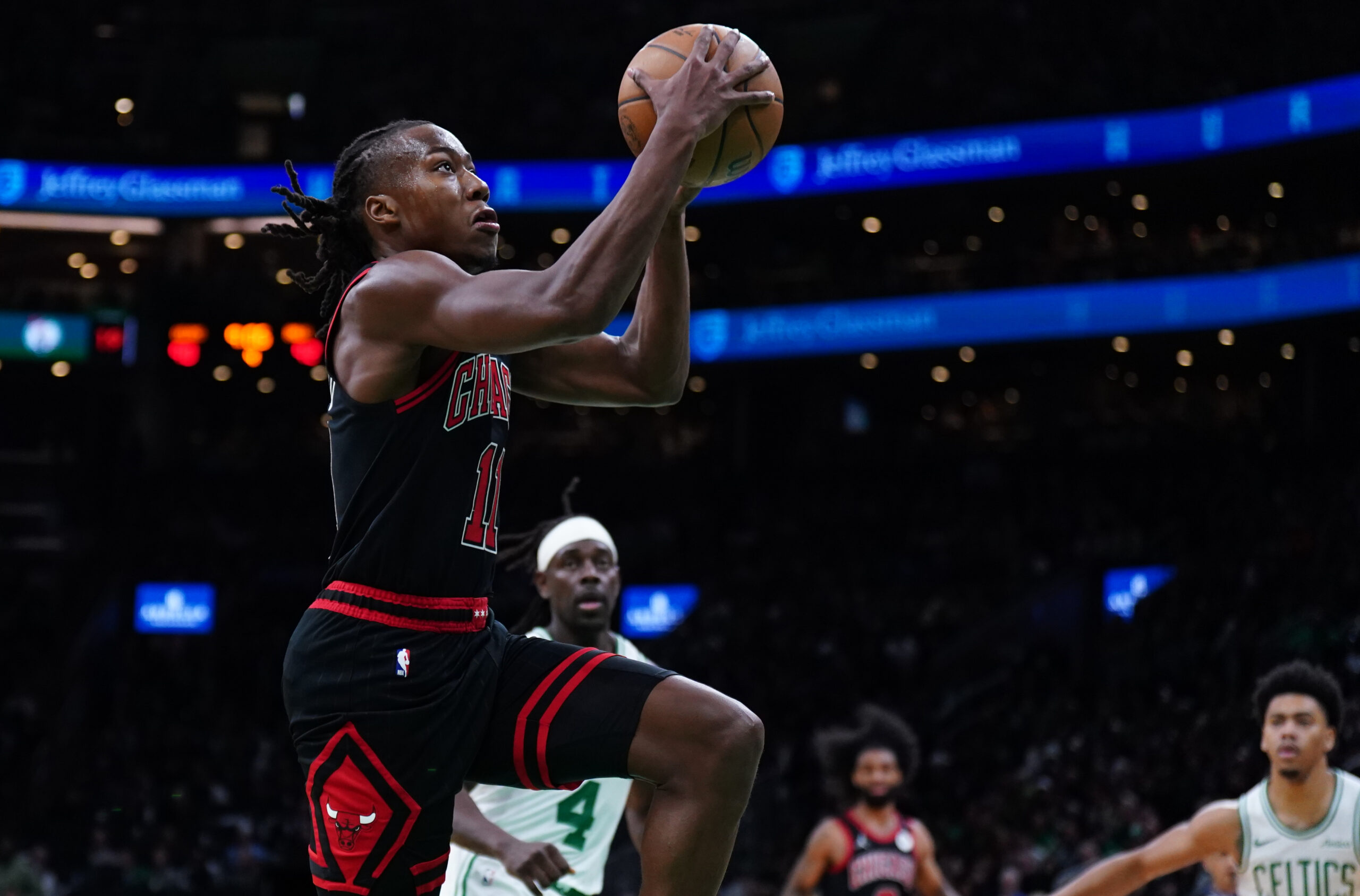 Former Illini Ayo Dosunmu going up for a layup vs the Celtics.