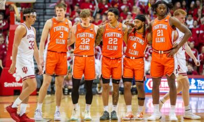 Illinois basketball players standing together vs Indiana.