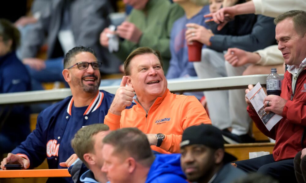 Illinois basketball coach Brad Underwood and Orlando Antigua.