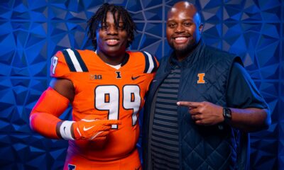 news: illinois football hosted King Liggins for a visit as he poses with Defensive line coach, Terrance Jamison.
