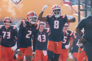 Illinois Football players entering the field.