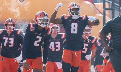 Illinois Football players entering the field.