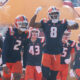 Illinois Football players entering the field.
