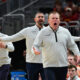 Illinois basketball coaching staff questions a call.