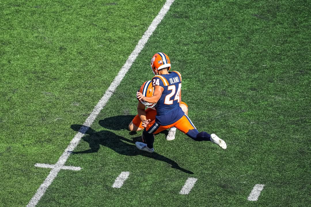 illinois kicker David Olano kicks a field goal.