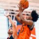 Illinois basketball guard Brandon Lee up against Mihailo Petrovic.