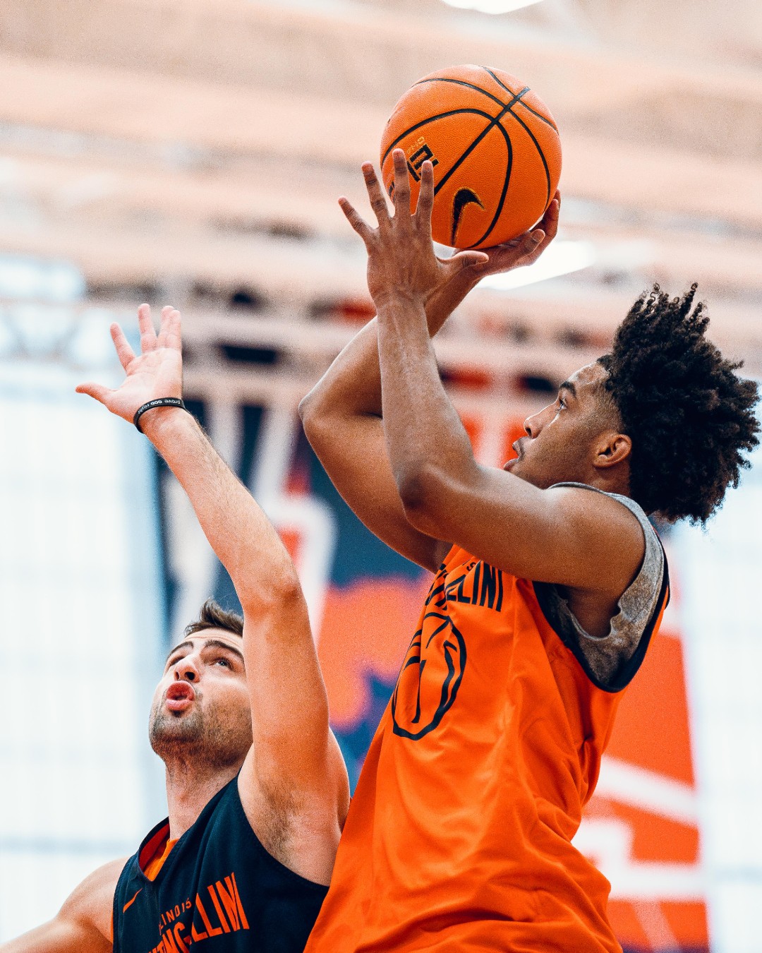Illinois basketball guard Brandon Lee up against Mihailo Petrovic.
