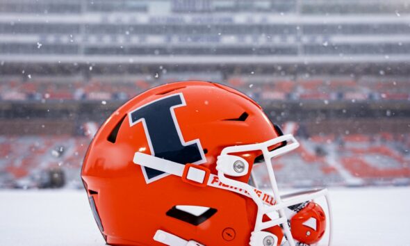 Illinois football helmet out in the snow