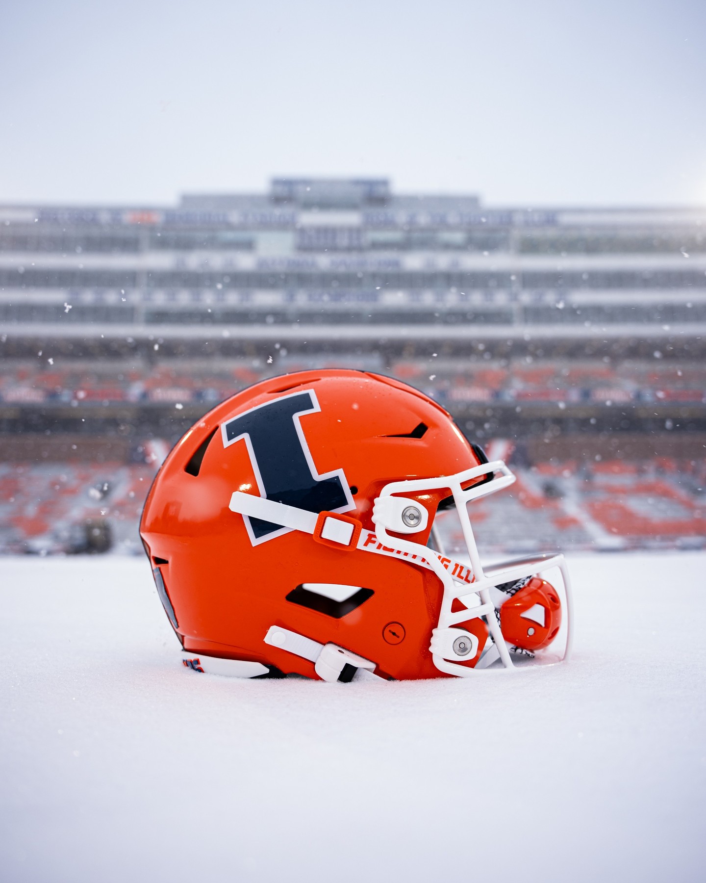 Illinois football helmet out in the snow