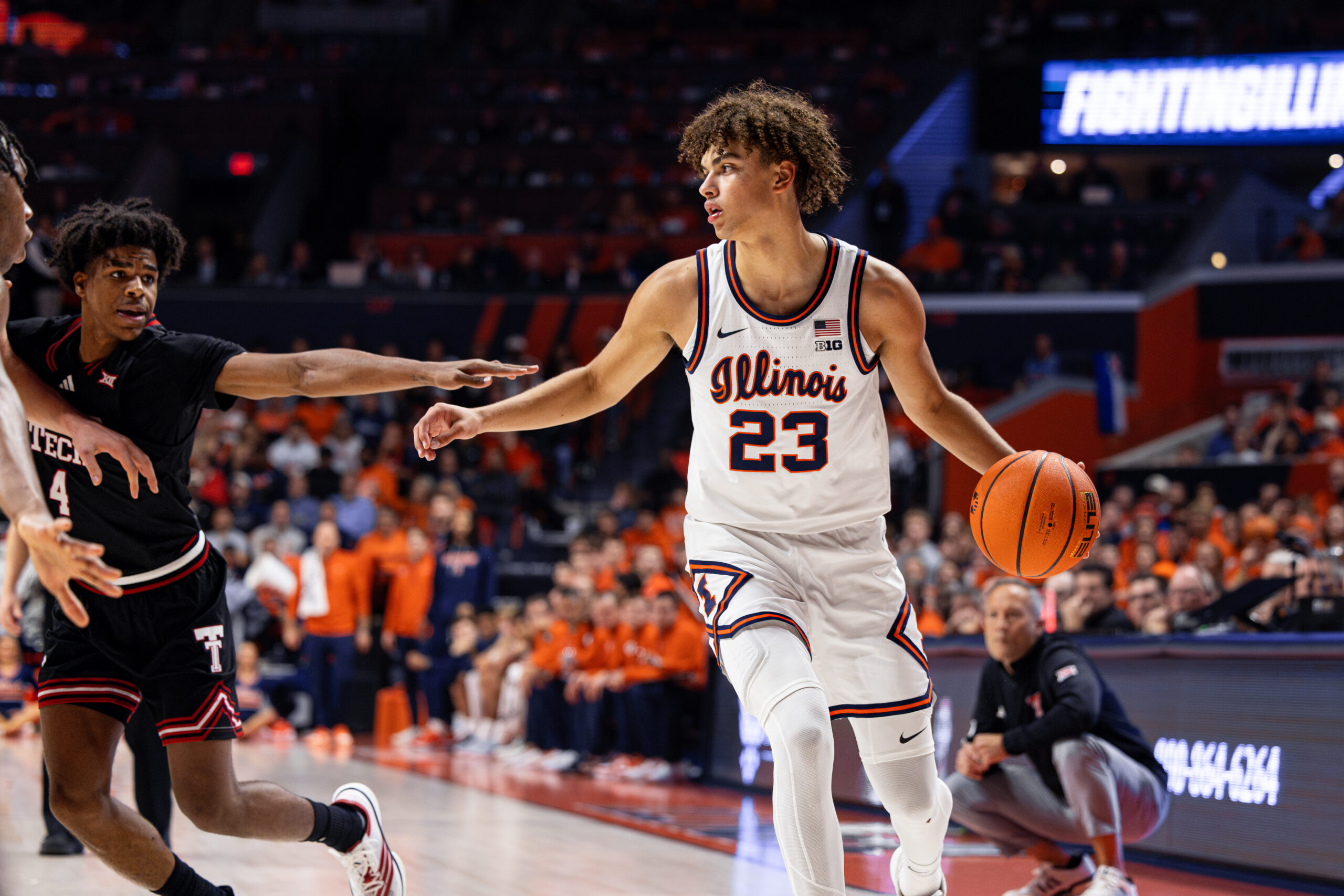 Illini guard Keaton Wagler dribbling it out vs Texas Tech.