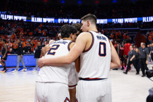 Illinois basketball. David Mirkovic and Andrej Stojakovic huddled up. Photo Credit: David Pollak, Armchair Illini.