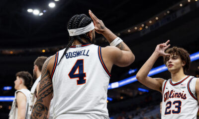 Illinois basketball guard Kylan Boswell and Keaton Wagler celebrating at the 2025 Braggin' Rights game.