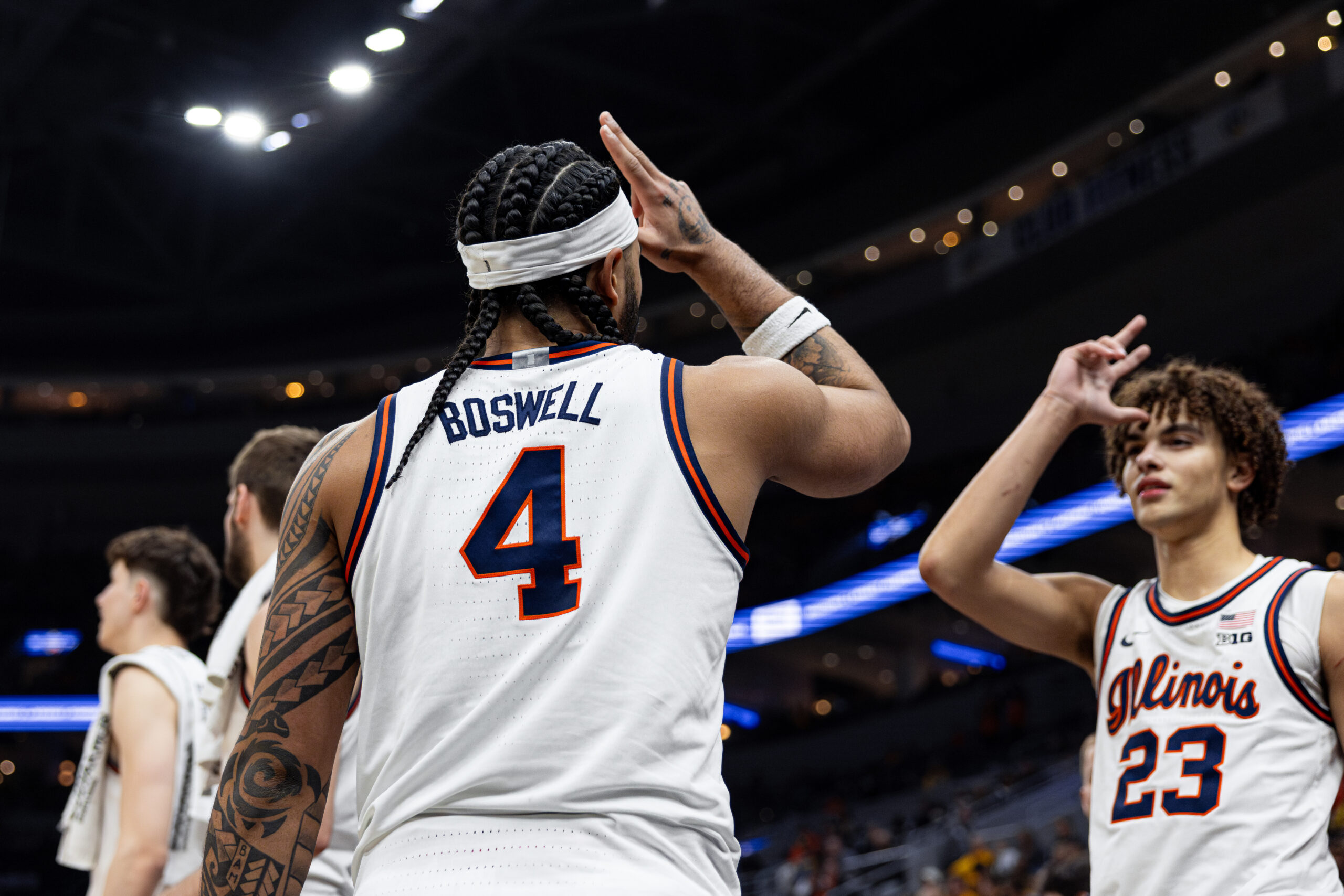 Illinois basketball guard Kylan Boswell and Keaton Wagler celebrating at the 2025 Braggin' Rights game.