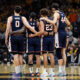 Illinois basketball team huddled up vs Iowa.