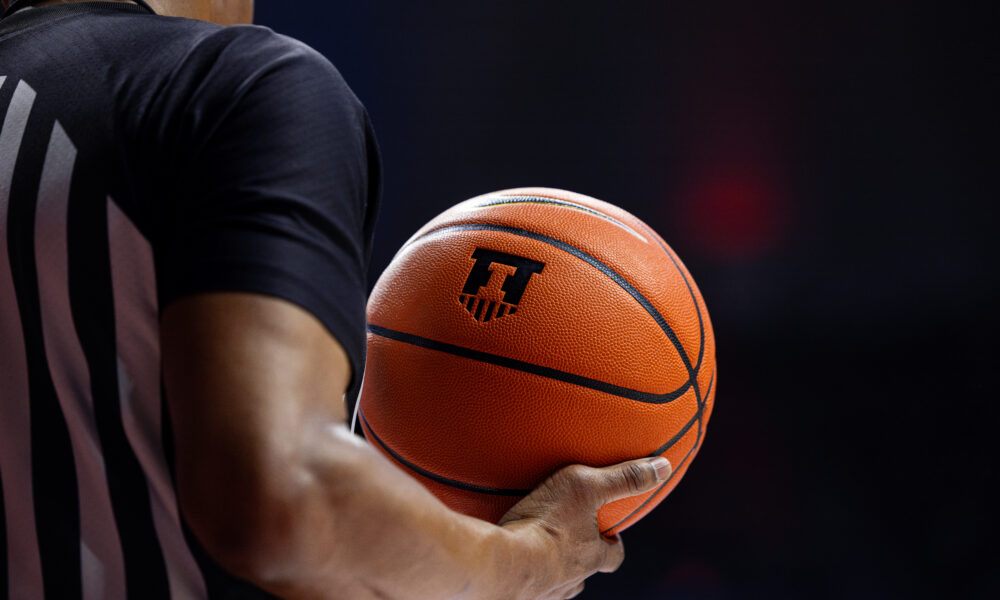 Illinois basketball ball out in State Farm Center.