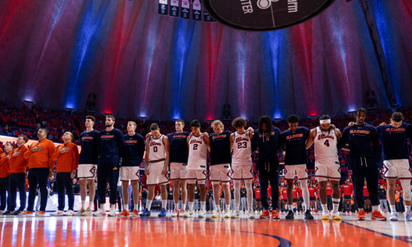 The Illinois basketball team standing front and center before the National Anthem. Photo Credit: David Pollak, Armchair Illini.