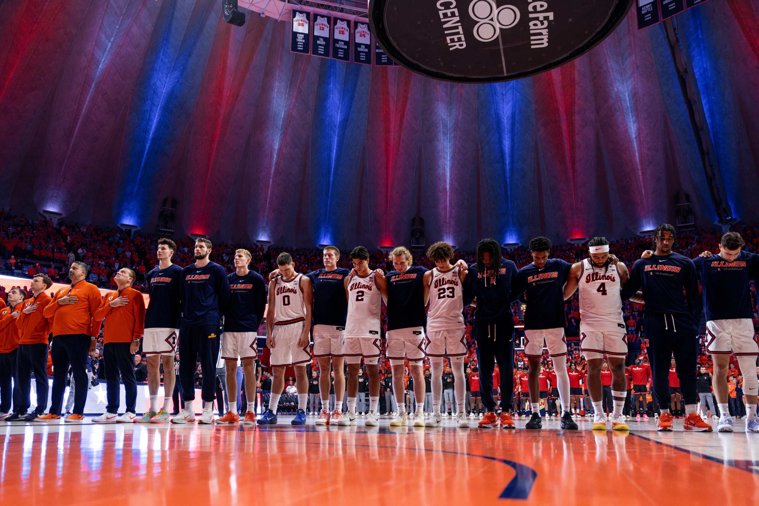 The Illinois basketball team standing front and center before the National Anthem.