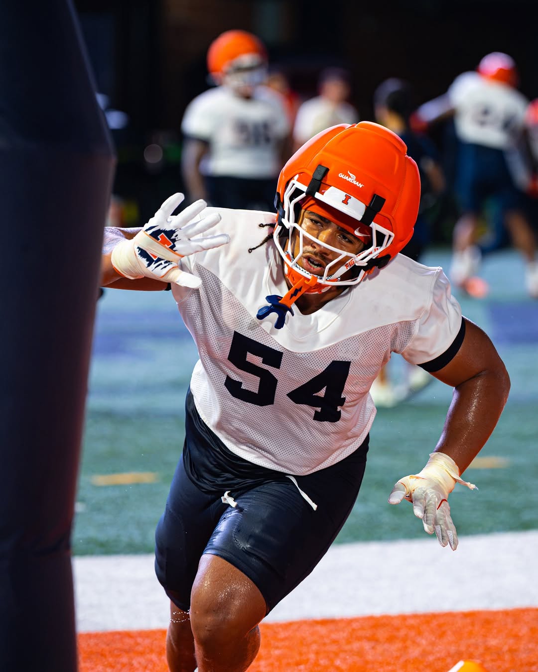 Demetrius John. Bag Drills. No. 54. Bobby Hauck 3-3-5 Defense. Illinois Football. Photo Credit: Illinois Football on Instagram. (@illinifootball).