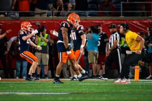 Armchair Illini. Illinois Football. Daniel Brown. Photo Credit. Daniel Down. Instagram. (@db.1038). No. 4. Celebrating.