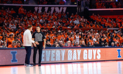 Illinois basketball coach Brad Underwood talks to the referee at State Farm Center