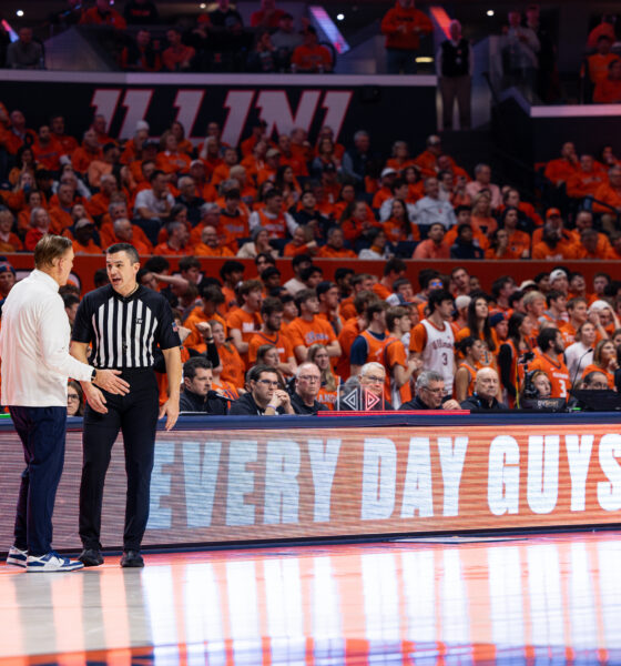 Illinois basketball coach Brad Underwood talks to the referee at State Farm Center