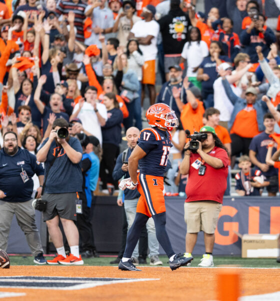 Illinois Football star Collin Dixon celebrates a late fourth quarter touchdown.