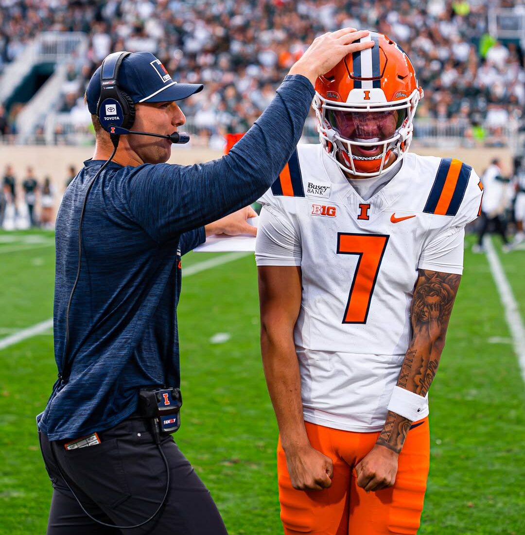 Illinois Football. Armchair Illini. Michael Clayton II (No. 7) and Coach Art Sitkowski. Photo Credit: Michael Clayton II on Instagram. (@clayt7n).