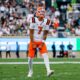 Illinois Football. Armchair Illini. Michael Clayton II. No. 7. Celebrating. Illinois wins 38-37. Vs. Michigan State. Photo Credit. Illinois Football. Instagram. (@Illinifootball).